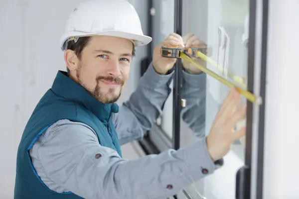 Man Measuring Window Prior Installation Roller Shutter — Stock Photo, Image