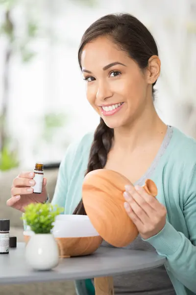 Woman Holding Open Diffuser Essential Oil Bottle — Stock Photo, Image