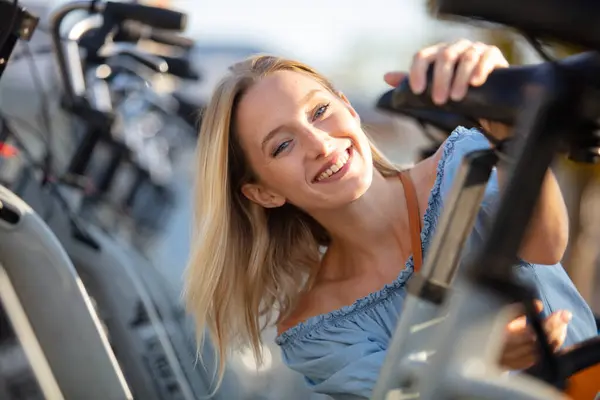 Girl Chooses City Bike Stock Image