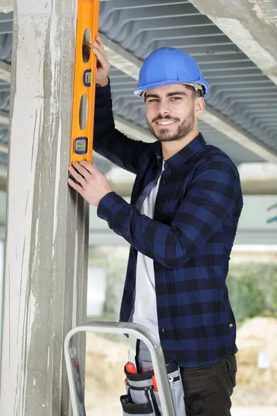 Handyman Professional Spirit Level Working Home Renovations Stock Photo