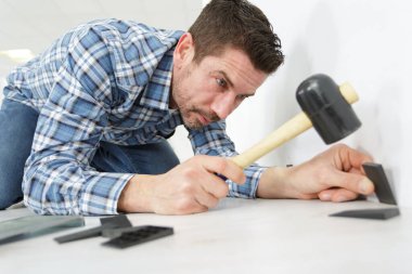 a worker joining parquet floor clipart