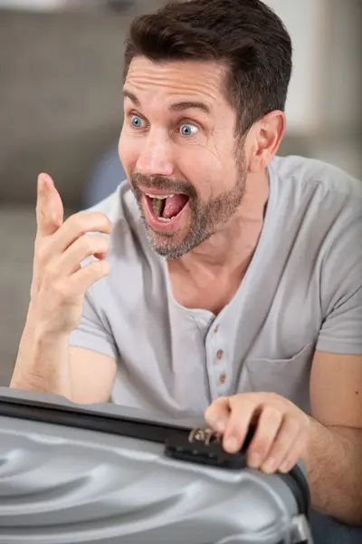 Happy Excited Man Finishing Prepare His Suitcase Vacation — Stockfoto