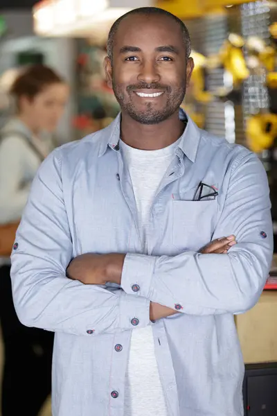 Handsome Male Warehouse Worker Arms Crossed Fotos de stock