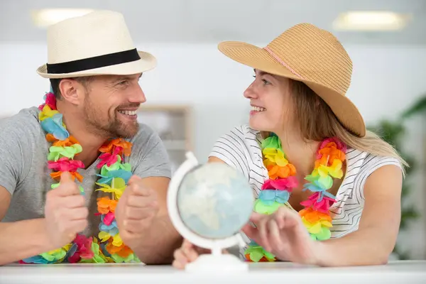 Excited Young Couple Planning Holiday Imagen De Stock