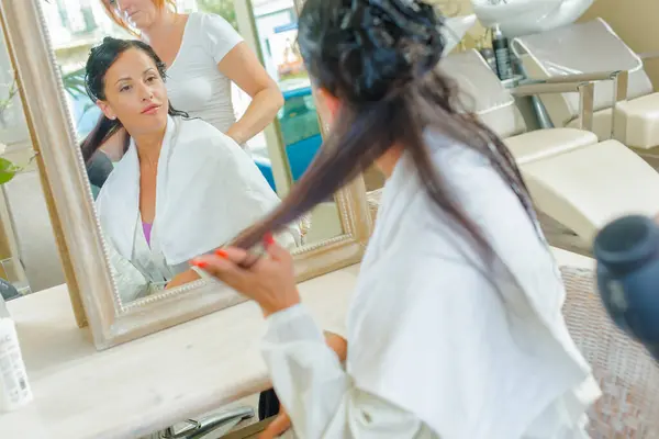 stock image a lady is at hairdressers