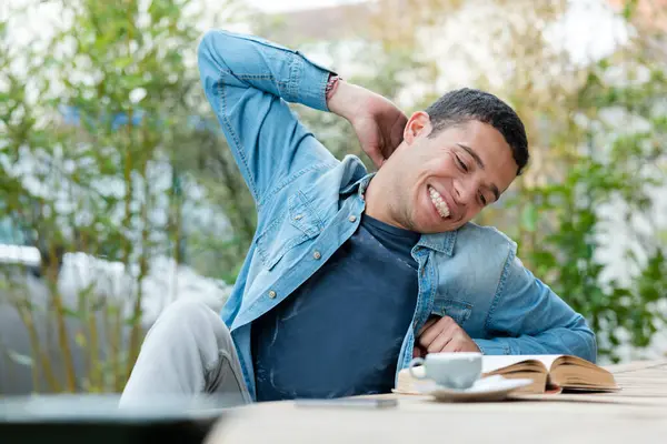 stock image a student stretches from fatigue