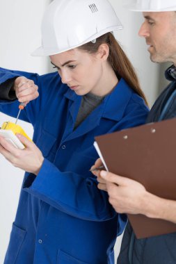 portrait of a female electrician clipart