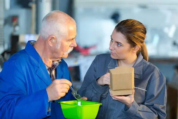 stock image warehouse workers eating lunch