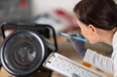 beautiful woman fixing computer parts clipart