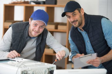 apprentice calibrating printer and apprentice clipart