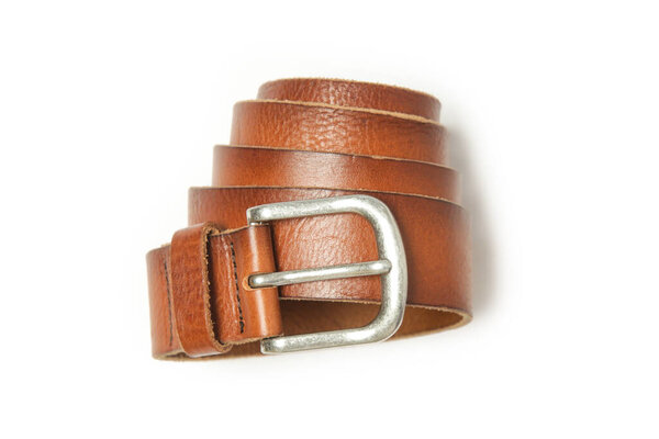 Brown leather belt with silver buckle isolated on white background