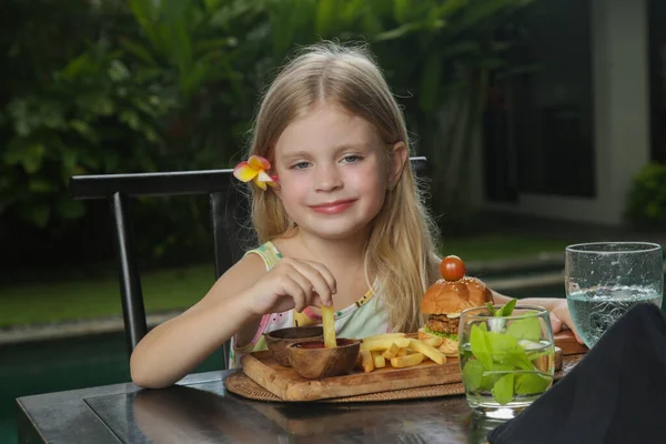 Little Girl Eating French Fries Tomato Sauce Restaurant — Fotografia de Stock