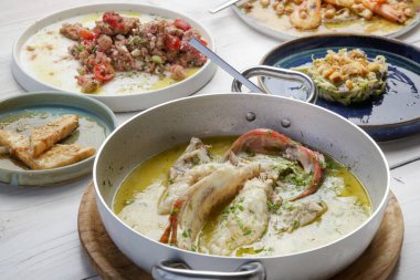Various Mediterranean dishes served on the restaurant table