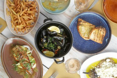 Various Mediterranean dishes served on the restaurant table