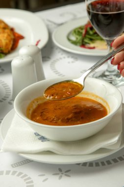 Harira  traditional Moroccan thick tomato lentils soup, Kosher Menu at the restaurant clipart