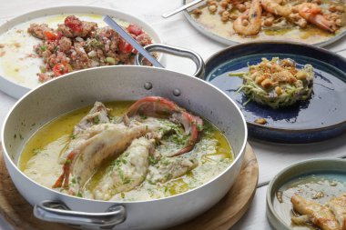 Various Mediterranean dishes served on the restaurant table