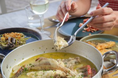 Various Mediterranean dishes served on the restaurant table