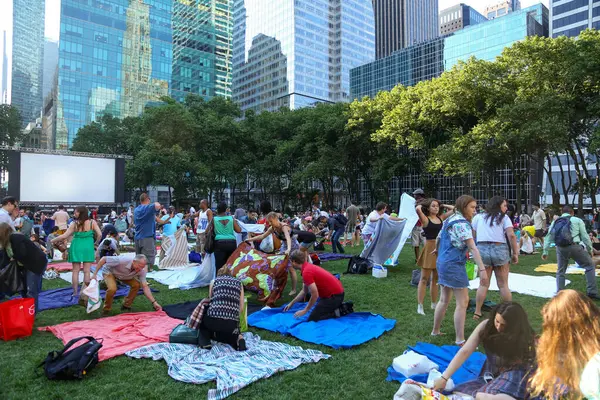 Stock image NEW YORK,USA - JUNE 2013 : Newyorkers and tourists enjoying the Bryant Park Summer Film Festival