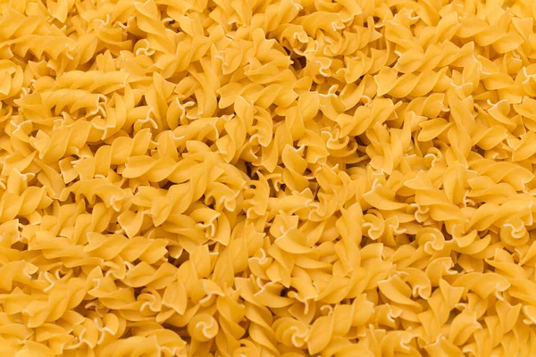 Uncooted Fusilli Pasta Background Текстура Яскравого Золота Сухого Макароні — стокове фото