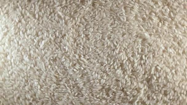 Kuru Pişmemiş Beyaz Pirinç Arka Planı Sola Dönüyor Üst Manzara — Stok video