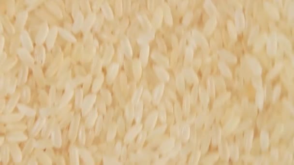 Droge Ongekookte Voorgekookte Rijst Achtergrond Bewegende Naar Boven Top View — Stockvideo