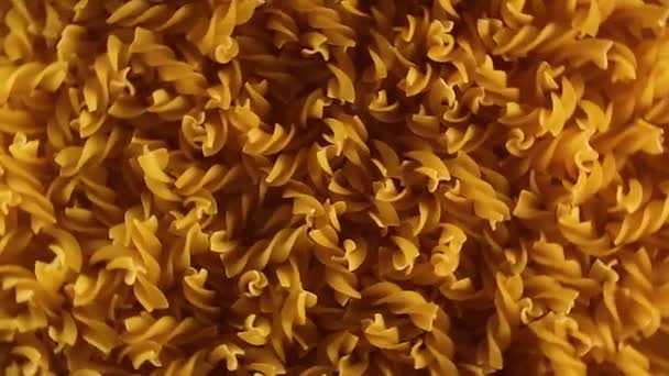 Uncooked Fusilli Pasta Top View Low Key Light Fat Unhealthy — Stockvideo