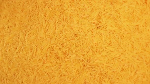 Background Uncooked Golden Noodles Rotating Clockwise Top View Texture Dry — Vídeo de stock