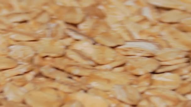 Uncooked Oat Flakes Rotating Macro Scattered Dry Raw Oat Flakes — Stockvideo
