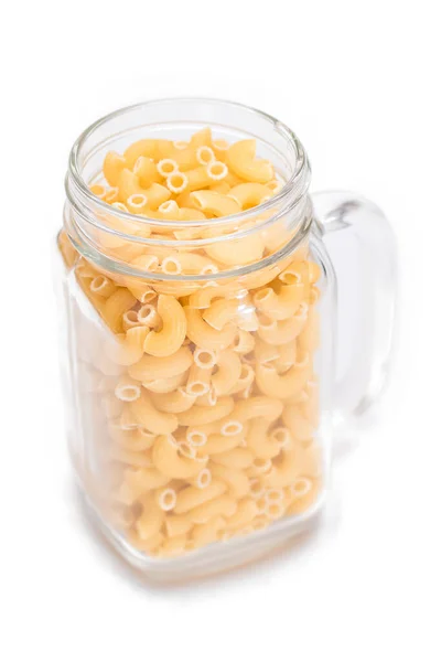 Uncooked Chifferi Rigati Pasta Glass Jar Isolated White Background Fat — Stock Photo, Image