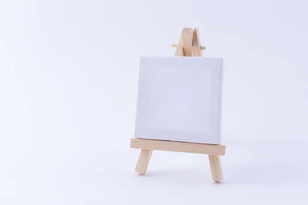 Wooden Easel Miniature Blank White Square Canvas Artists Painters Mockup — Stock Photo, Image