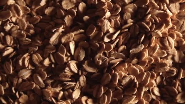 Oat Flakes Background Perlahan Lahan Rotating Right Top View Low — Stok Video