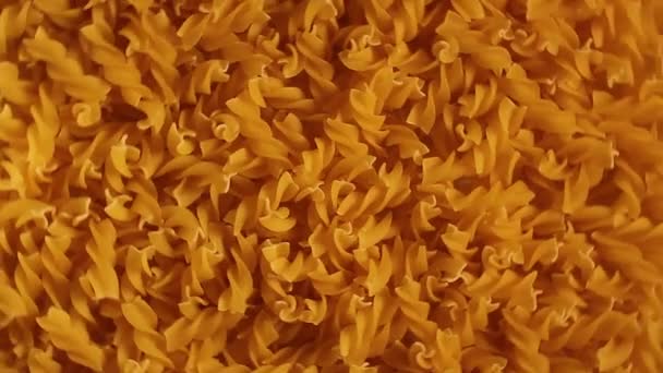 Uncooked Fusilli Pasta Top View Low Key Light Fat Unhealthy — Stok video