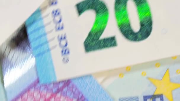 20ユーロ紙幣 回転マネーの背景 トップビュー ユーロ通貨 ブルーペーパーマネー 20ユーロ紙幣がたくさんあります ビジネス 現金および貯金の概念 Angular Rotation — ストック動画