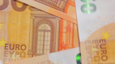 50 Euro 'luk banknotlar, Dönen Para Arkaplanı - Top View. Euro Para Birimi. Turuncu Kağıt Para. Bir sürü 50 Euro 'luk banknot. İş, Finans, Para ve Tasarruf Konsepti - Açısal Dönüşüm