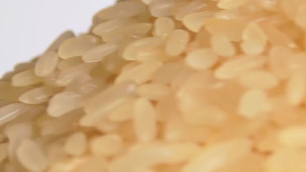 Dry Uncooked Parboiled Rice Heap Rotating Macro Pile Raw Long — Stok video