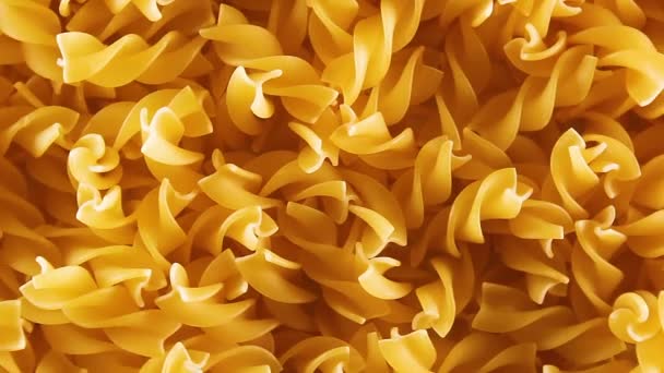 Uncooked Fusilli Pasta Top View Close Low Key Light Fat — стоковое видео