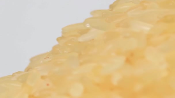 Wysuszyć Niegotowane Gotowane Stos Ryżu Rotating Makro Kupa Surowego Ryżu — Wideo stockowe