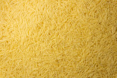 Pişmemiş Filini Makarnası: Gurme Aşçılığı İçin Canlı ve Dokulu Bir Arkaplan Oluşturan Bir Mutfak Makarnası. Kuru makarna. Raw Macaroni - Top View, Düz Yat