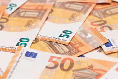 50 Euro Banknotlar Para Arkaplanı. Euro Para Birimi. Turuncu Kağıt Para. Bir sürü 50 Euro 'luk banknot. İş, Mali, Nakit ve Para Tasarruf Konsepti