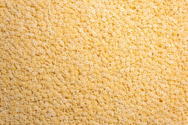 Pişmemiş Stelline Makarna: Gurme Aşçılığı İçin Canlı ve Dokulu Bir Arkaplan Oluşturan Stelline Makarna Mutfağı. Kuru makarna. Raw Macaroni - Top View, Düz Yat