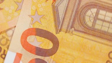 50 Euro 'luk banknotlar, döner para arkaplanı - Top View, Macro. Euro Para Birimi. Turuncu Kağıt Para. Bir sürü 50 Euro 'luk banknot. Finansal, Nakit ve Para Tasarruf Konsepti - Dönüşüm Sola