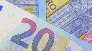 20 Avro Fatura, Dönüşümlü Para Arkaplan - Top View, Macro. Euro Para Birimi. Mavi Kağıt Para. Bir sürü 20 Euro banknot. İş, Para ve Tasarruf Konsepti - Yavaş Döndürme Sağı