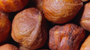 Dağıtılmış Fındık Kabuğu - Üst Manzara, Dönüyor. Fındık Arkaplanı 'na dönüyoruz. Doğal Yüksek Kalorili Atıştırmalıklar - Döndürme