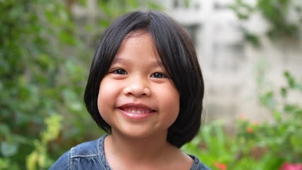 Portrait Funny Little Asian Girl Big Smiling Child Looking Camera — Stock Video