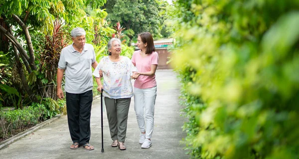 Happy Family Walking Together Garden Old Elderly Using Walking Stick Stock Picture