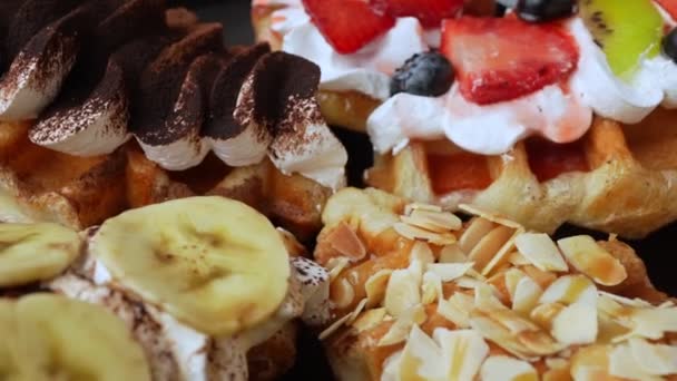 Closeup Top View Sweet Fruit Cream Topping Waffles Rotating Strawberry — Stock Video