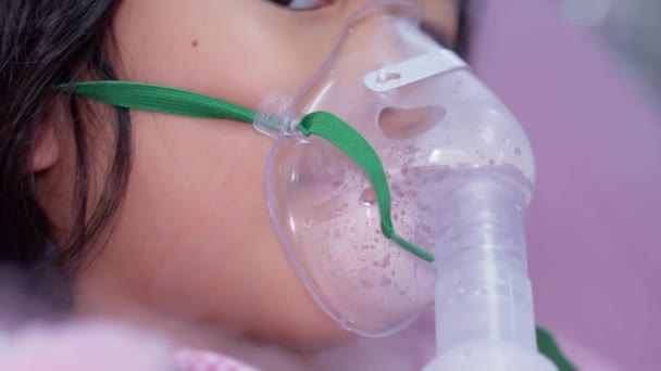 Little Asian Girl Has Oxygen Mask Breathing Nebulizer Hospital Concept — Stock Video