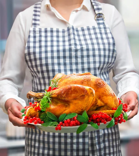 Woman Holds Golden Roasted Christmas Thanksgiving Turkey Garnished Red Berries Royalty Free Stock Photos