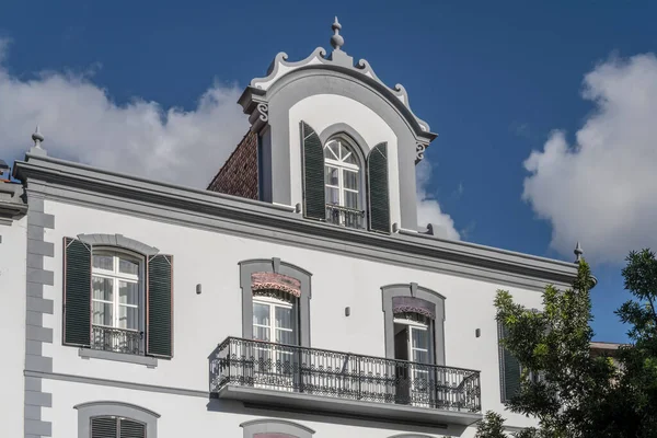 stock image cityscape with balcony and  windows of traditional building in town street, shot in bright fall light at Funchal, Madeira, Portugal