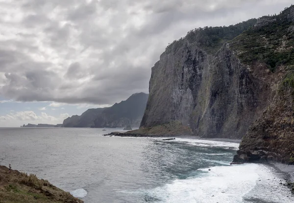 stock image landscape with island northern steep shore on Atlantic ocean east of Fortim de Faial, shot in bright cloudy fall light at Madeira, Portugal